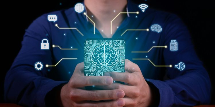 A man who uses artificial intelligence inside a cell phone to manage his networks and databases